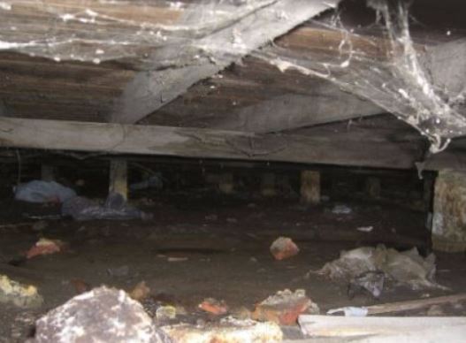 a picture of a dirty crawl space in walnut creek, ca